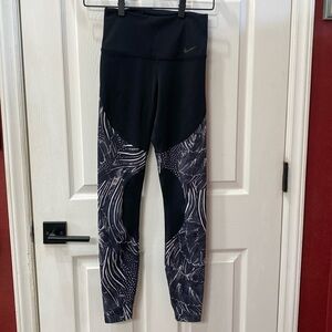 - NWOT nike feather leggings